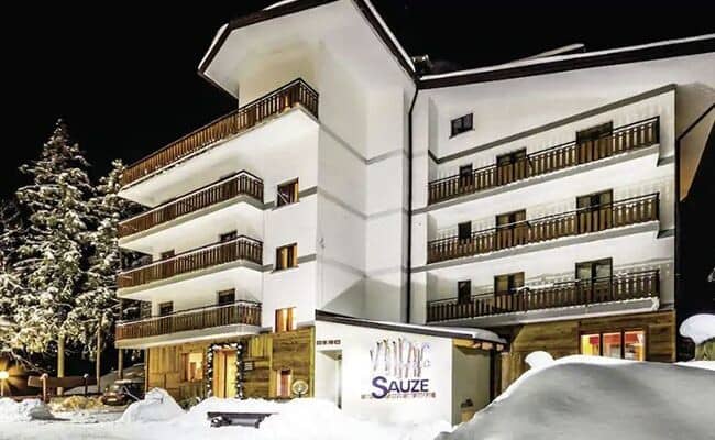 Ski-in/ski-out apartment building with private balconies and mountain views