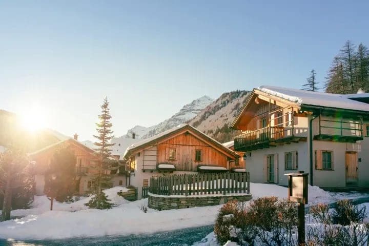 Chalet exterior with private balcony and mountain views
