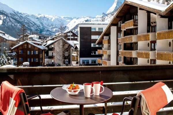 Private balcony with Matterhorn mountain views and bistro seating