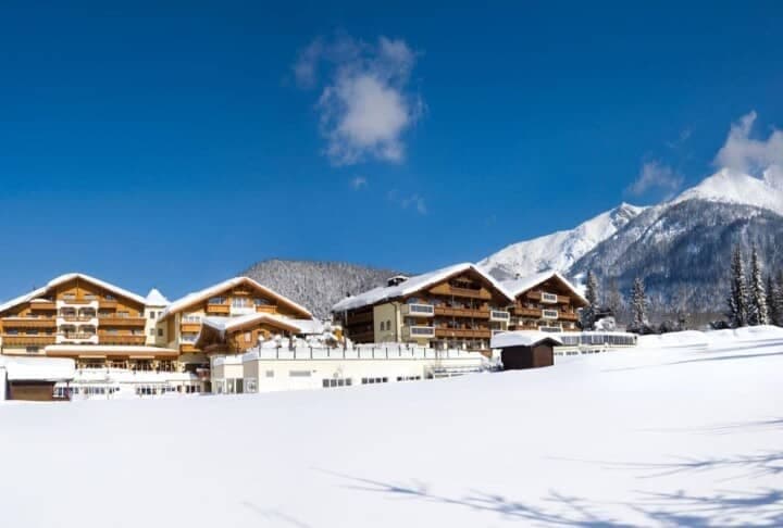 Ski-in/ski-out chalet exterior with private balconies and mountain views