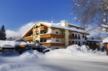 Ski-in lodge featuring private balconies and multi-story layout