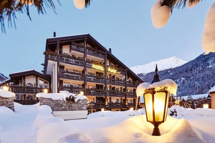 Chalet exterior with private balconies and mountain views