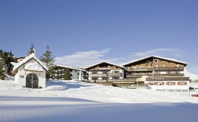 Ski-in, ski-out hotel exterior located directly on the slopes