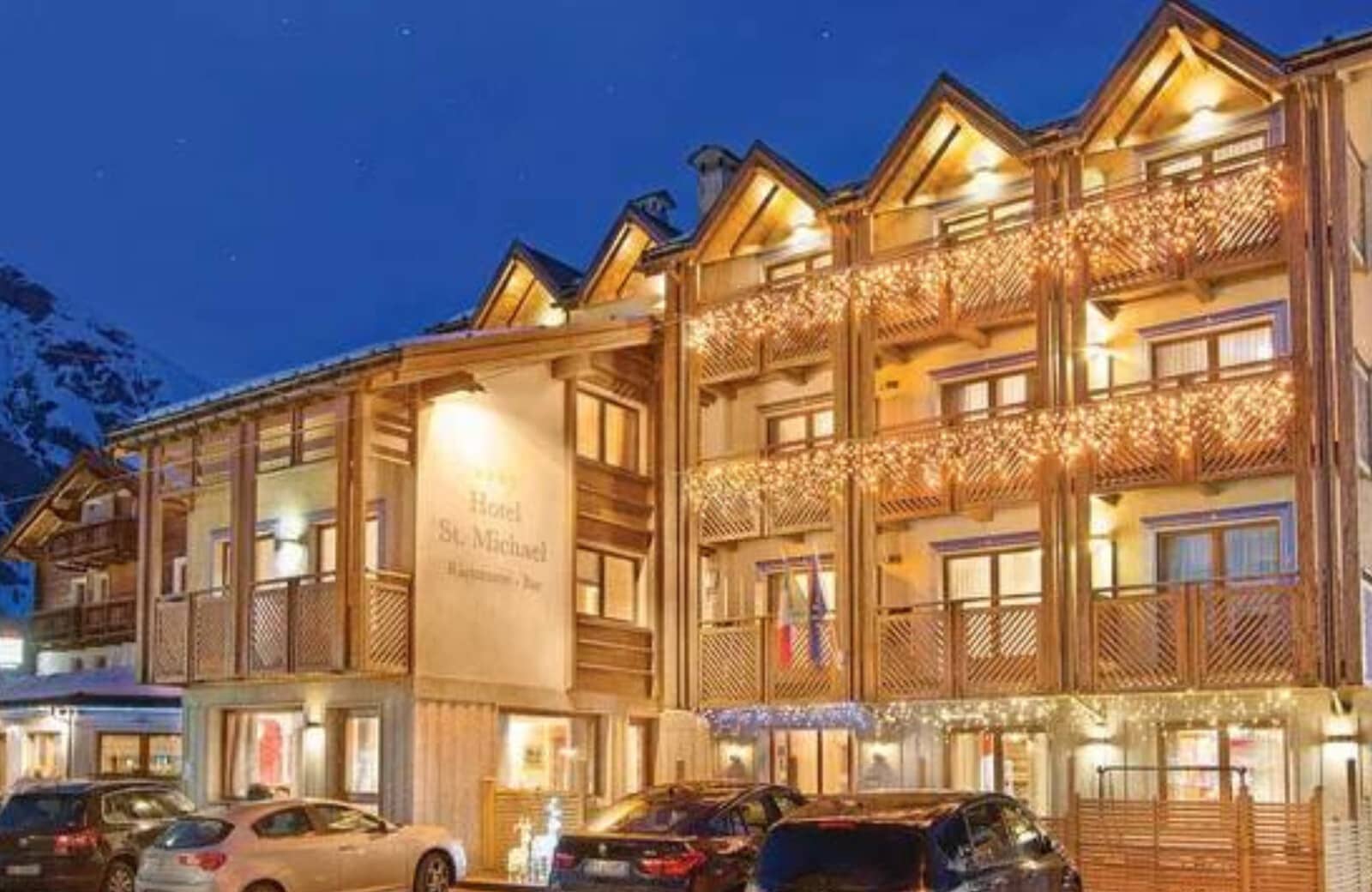 Chalet-style exterior with private balconies and on-site parking