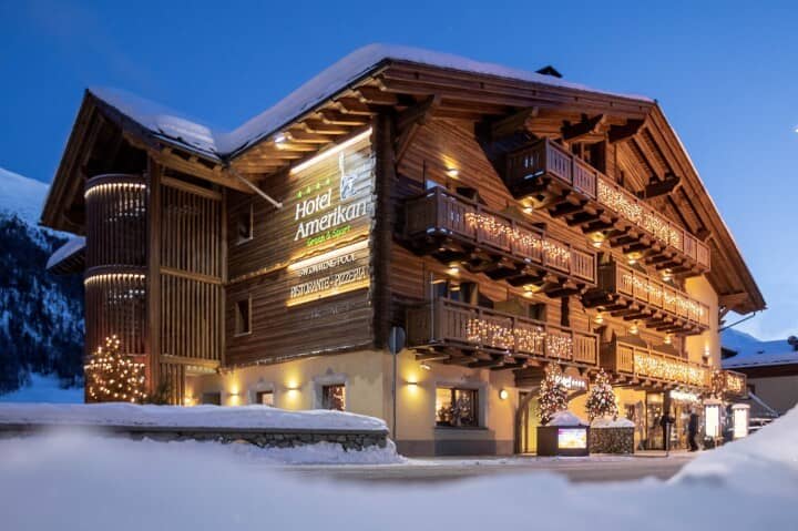 Chalet exterior with private balconies and on-site restaurant and pizzeria
