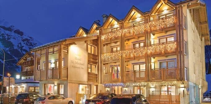 Chalet exterior with private balconies and on-site parking