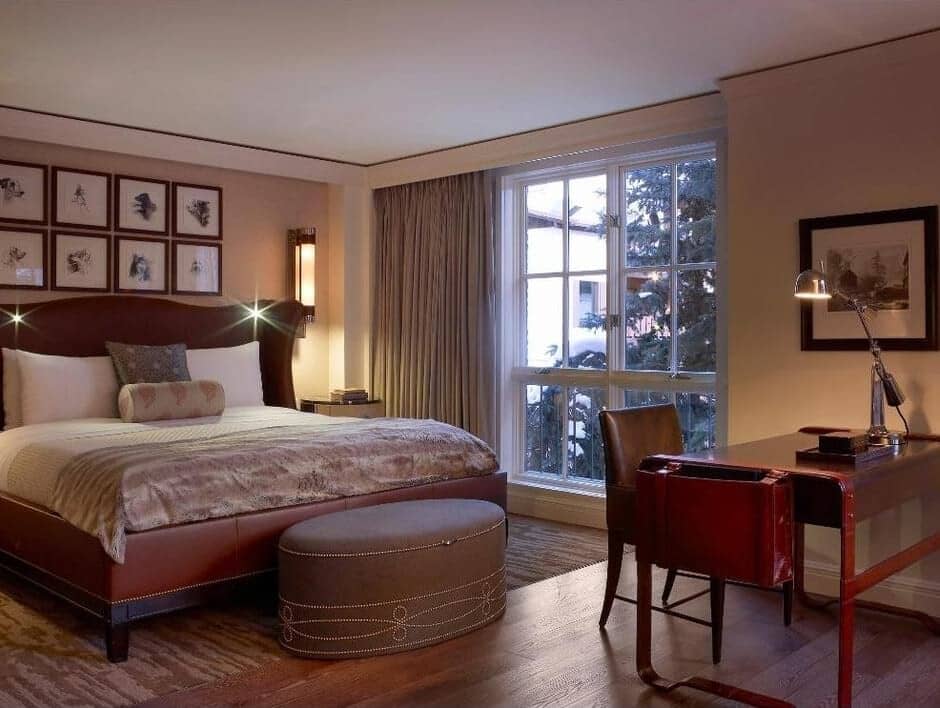 Primary bedroom with king bed and dedicated workspace