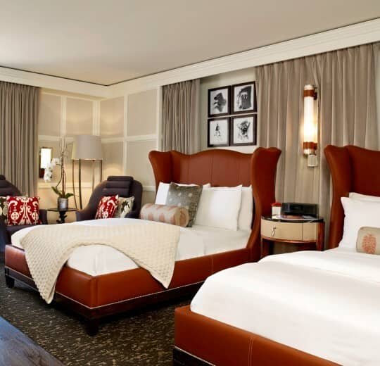 Guest bedroom with two queen beds and black-out curtains