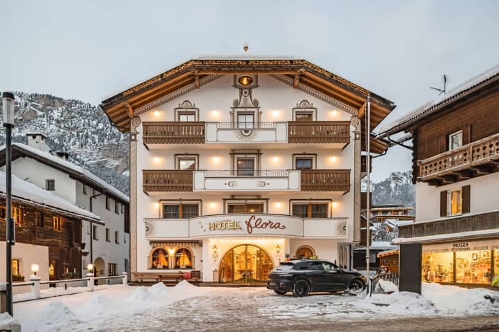 Chalet-style exterior with private balconies and mountain views