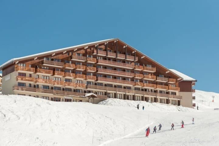 Ski-in, ski-out resort building with private balconies and mountain views