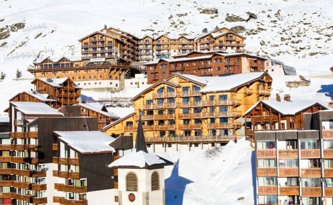 Ski-in/ski-out resort exterior with direct access to high-altitude slopes