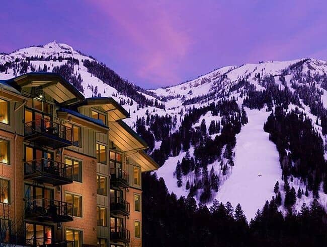 Ski-in, ski-out resort exterior with private balconies and mountain views
