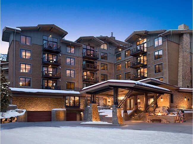 Ski-in/ski-out lodge entrance with heated porte-cochère and underground parking