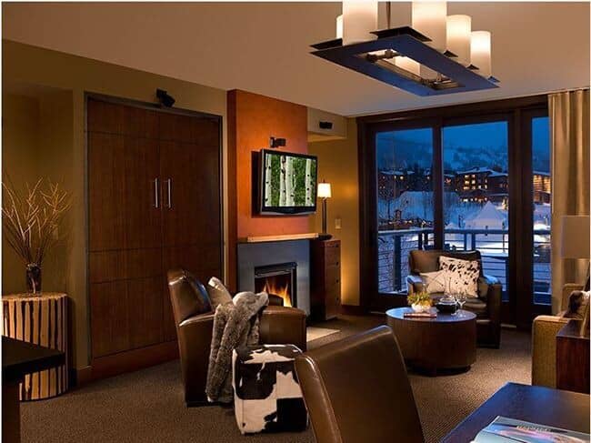 Living area with gas fireplace and queen-sized Murphy bed