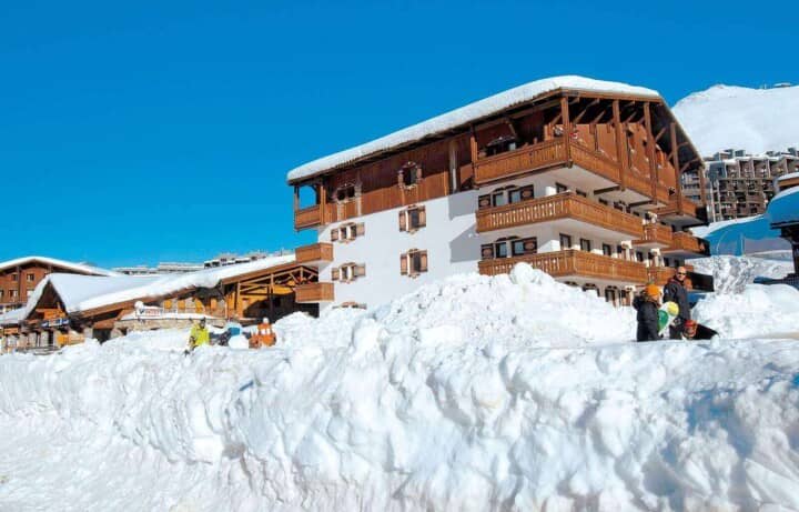 Ski-in/ski-out chalet with multiple private balconies and direct slope access