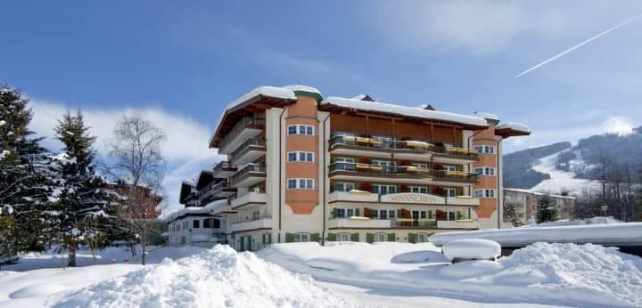 Hotel exterior with private balconies and direct ski slope access