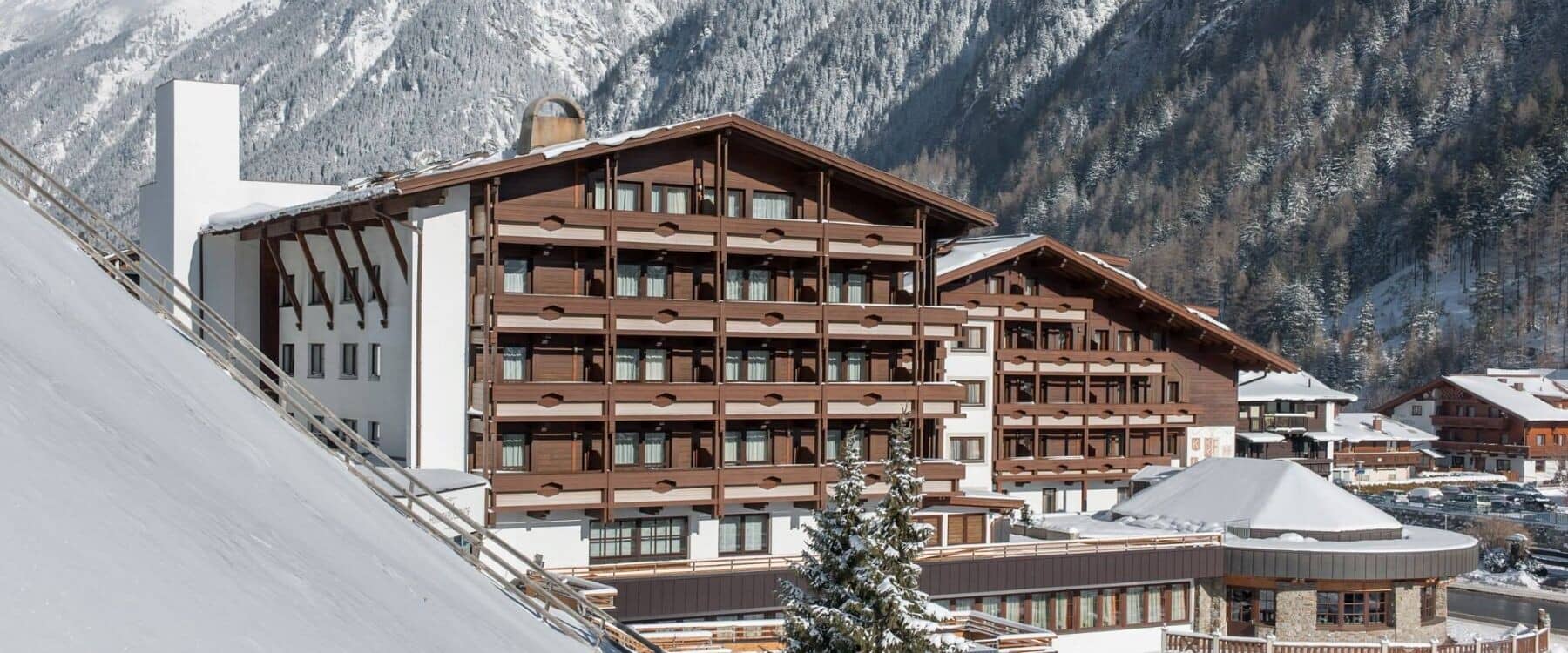 Ski-in ski-out lodge with private balconies and mountain views