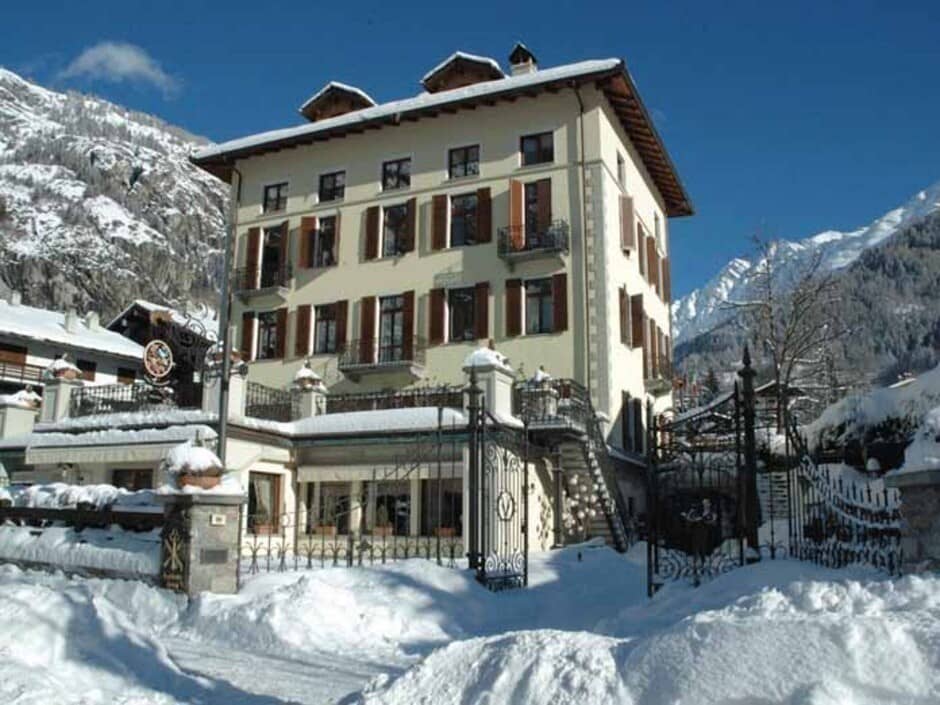 Four-story villa with gated entrance and mountain views