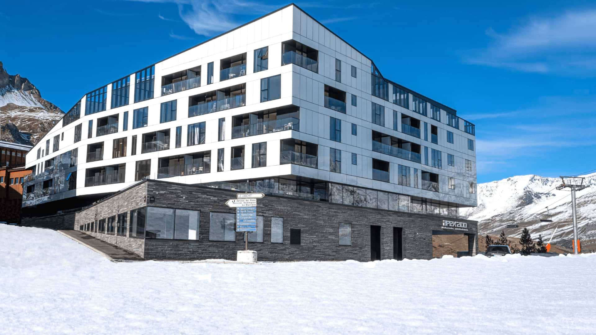Ski-in/ski-out apartment complex exterior with immediate access to chairlifts