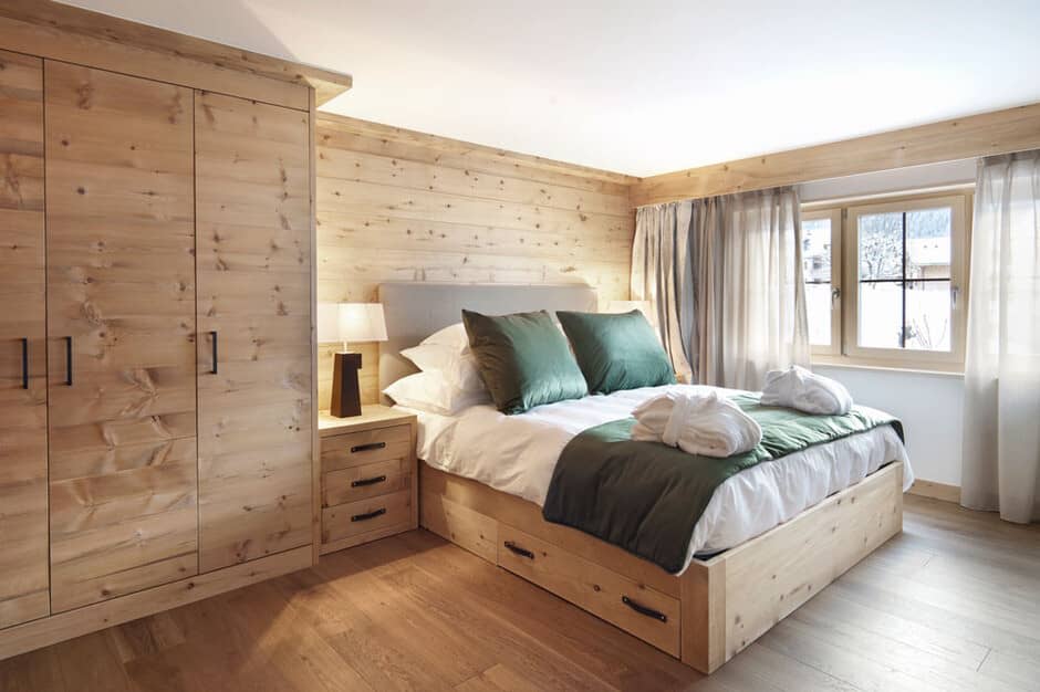 Bedroom with built-in wardrobe and under-bed storage drawers