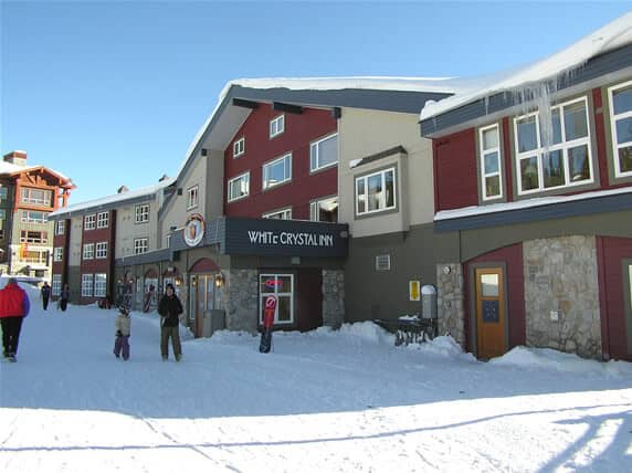 White Crystal Inn exterior; direct ski-in/ski-out access to village runs