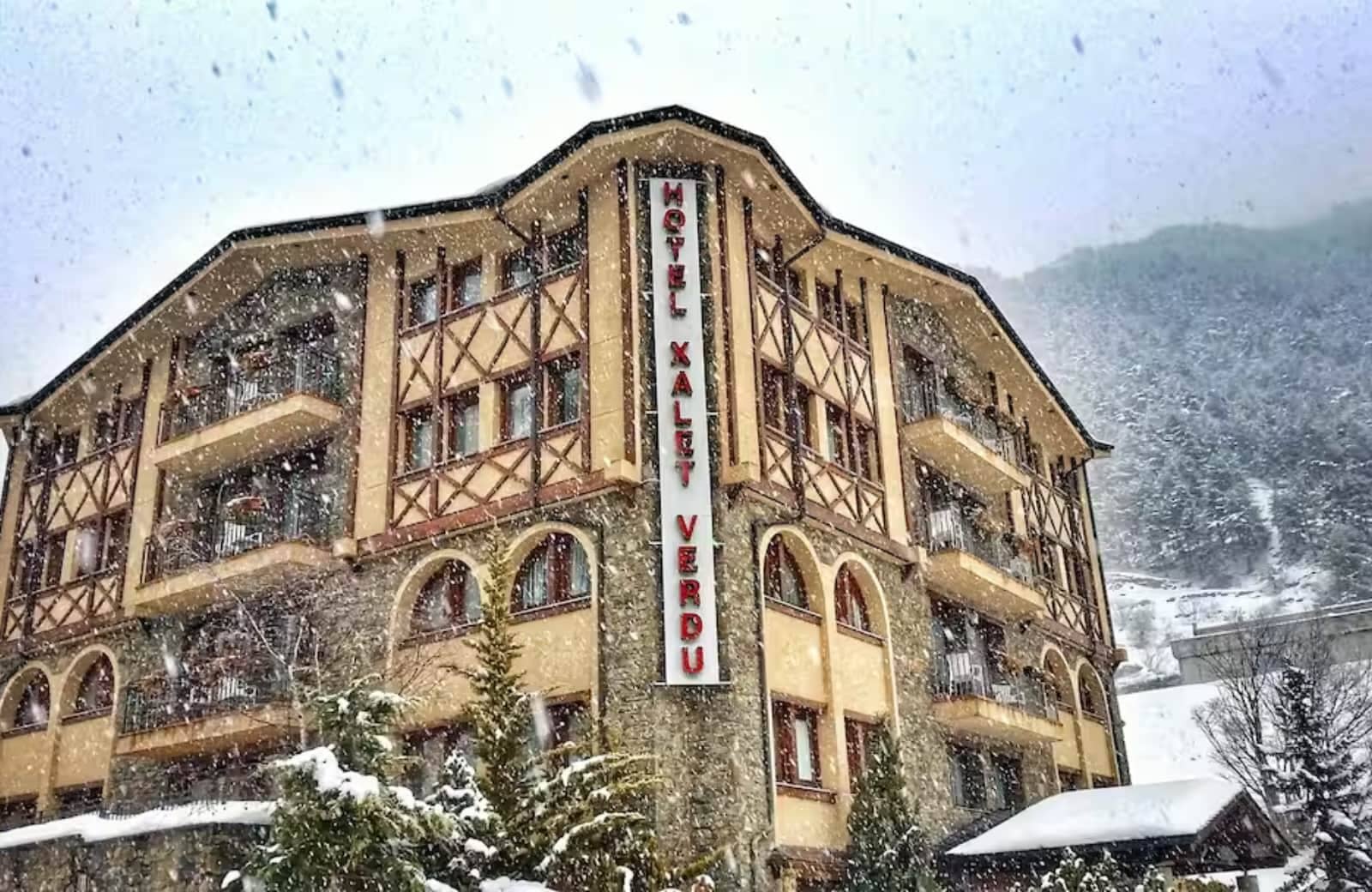 Hotel Xalet Verdu exterior featuring private balconies and mountain views