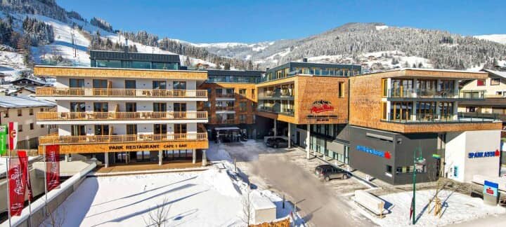 Ski resort exterior with on-site restaurant and mountain slope views