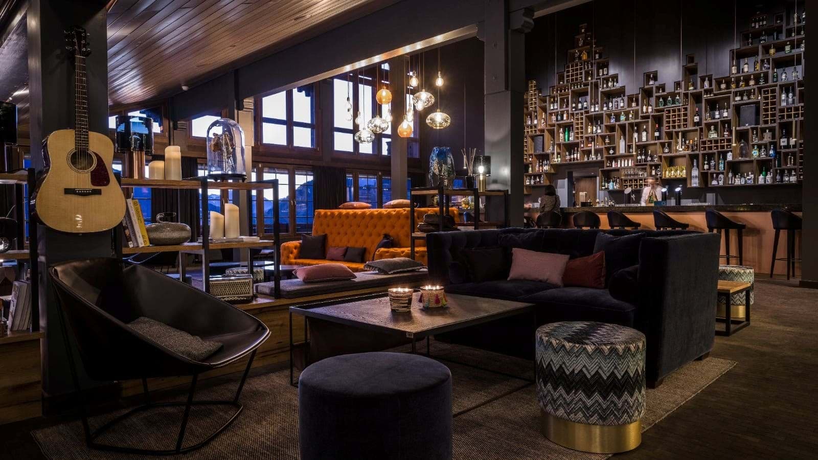 Lounge and cocktail bar with mountain views and acoustic guitar