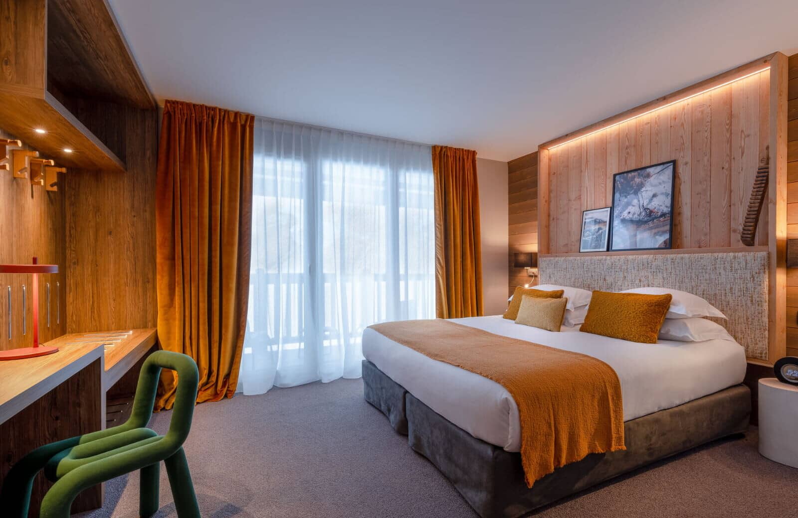 Bedroom with king bed, dedicated workspace, and balcony access