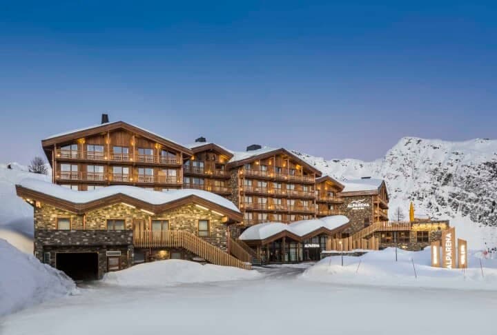 Ski-in/ski-out chalet exterior with private balconies and underground parking