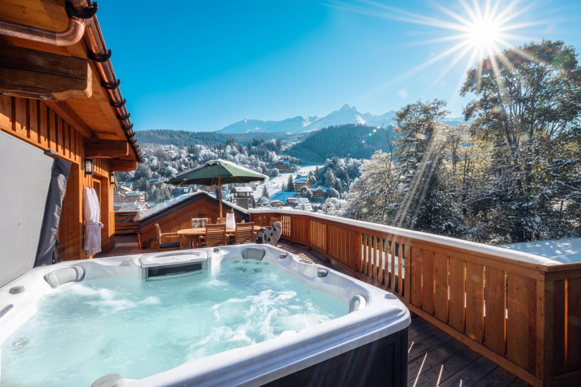 Outdoor hot tub seats 6; mountain views and dining terrace