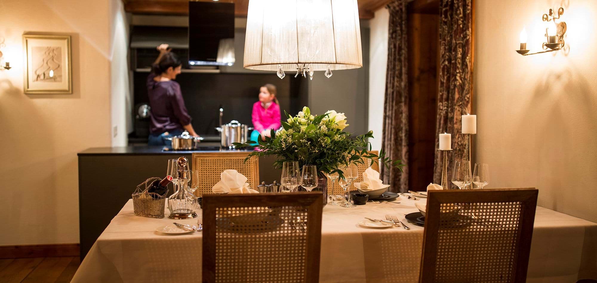 Dining area with seating for 6; adjacent to open-plan kitchen