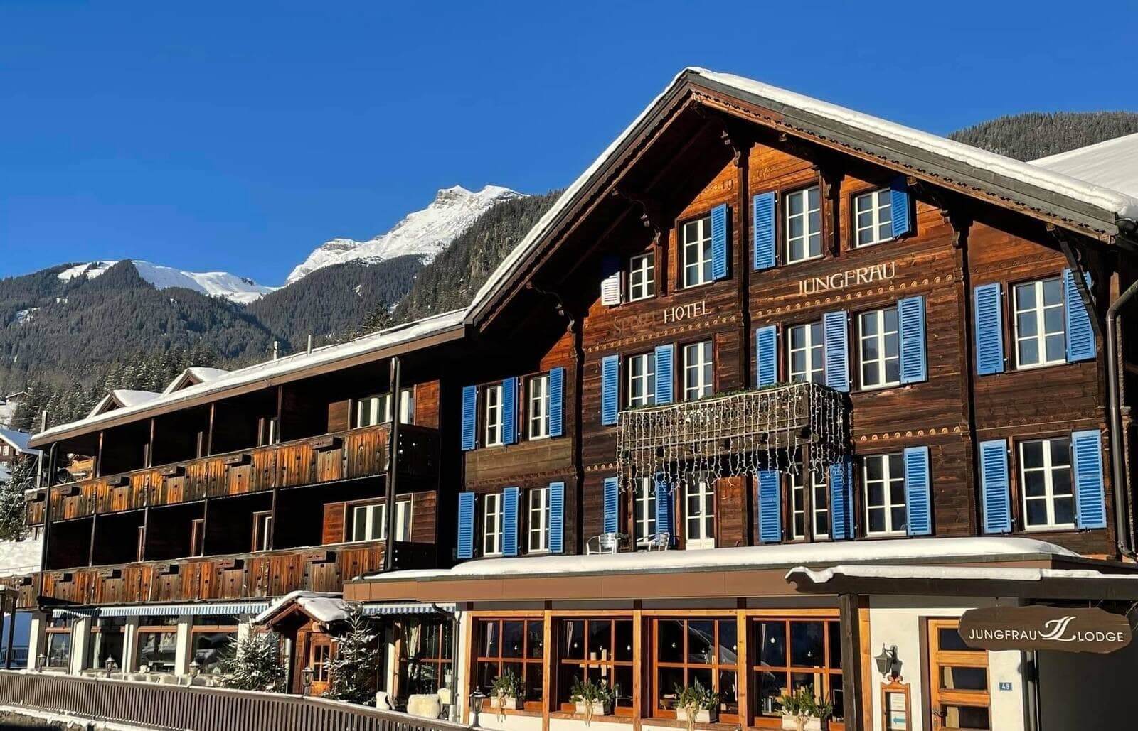 Traditional timber lodge with private balconies and Eiger mountain views
