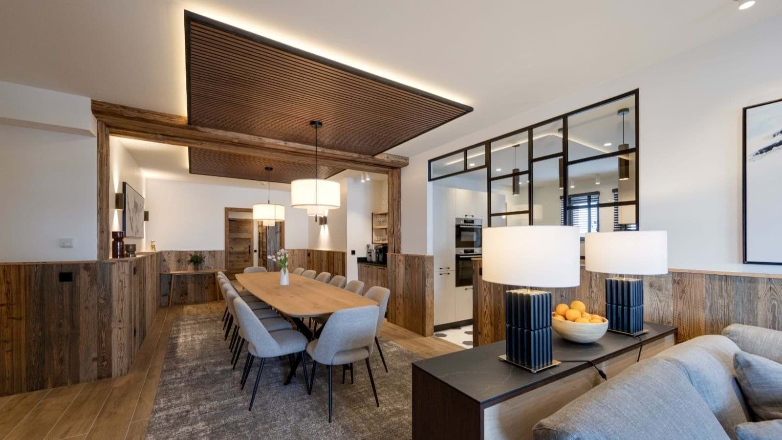 Dining area with seating for 10 and semi-open kitchen access