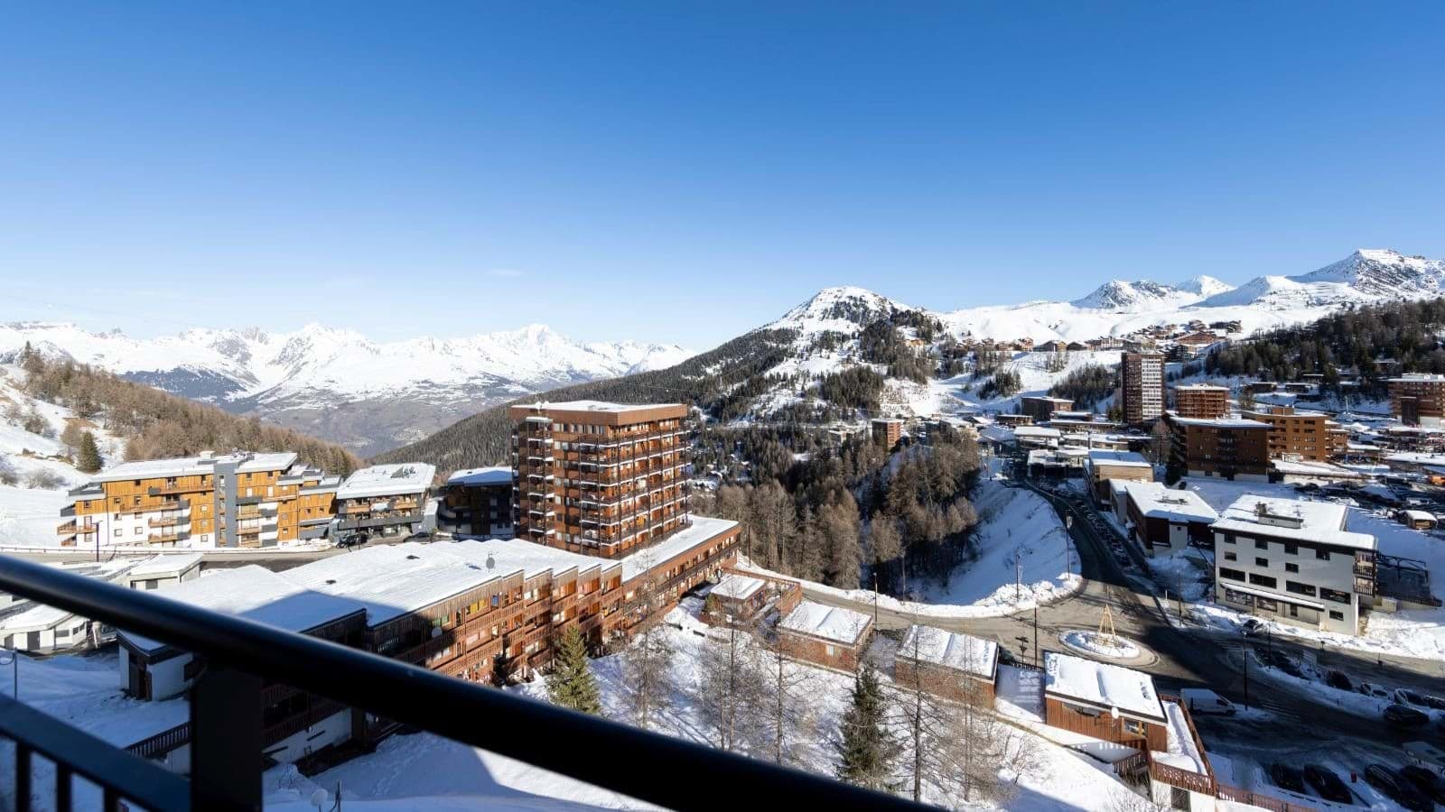 Private balcony view of Plagne Village and surrounding mountain peaks
