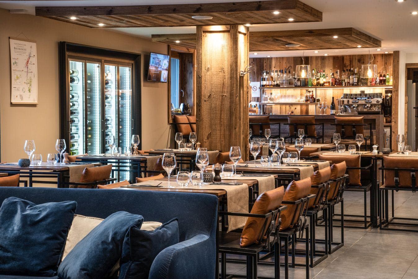 Dining area and bar with climate-controlled wine storage and espresso machine