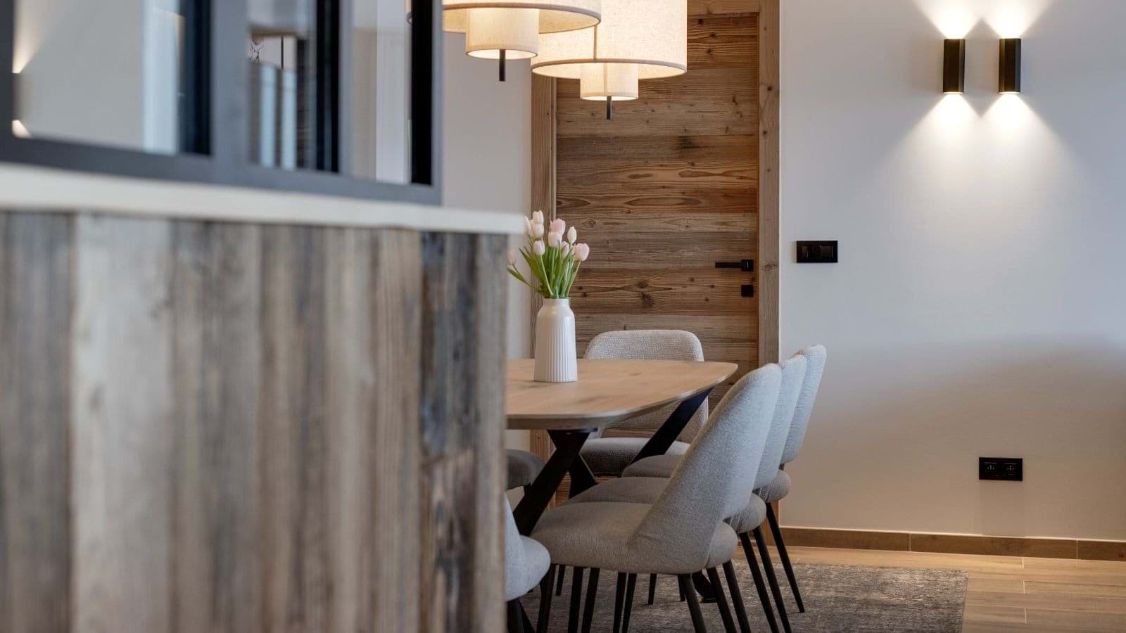 Dining area with seating for 6 and reclaimed wood door