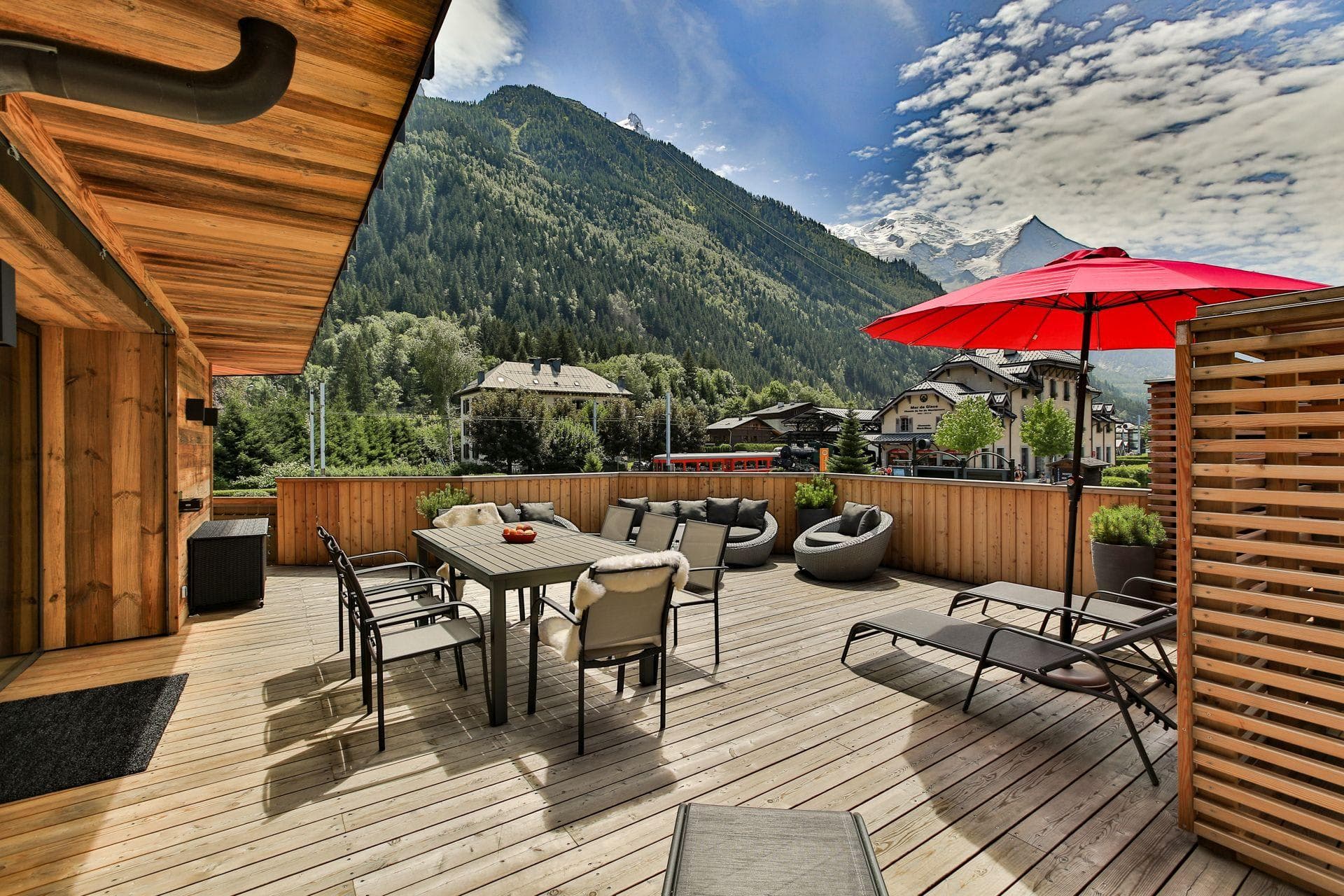 Private deck with dining for 6 and views of Mont Blanc