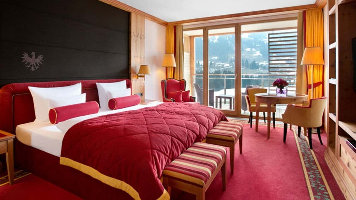 Primary bedroom with king bed and private balcony access