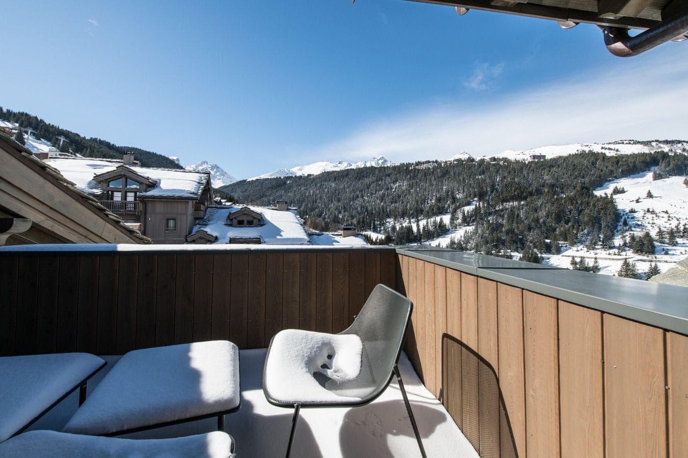 Private balcony with mountain views and overlook of local ski runs