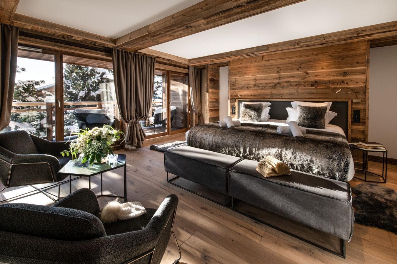 Primary bedroom with king bed and private balcony access