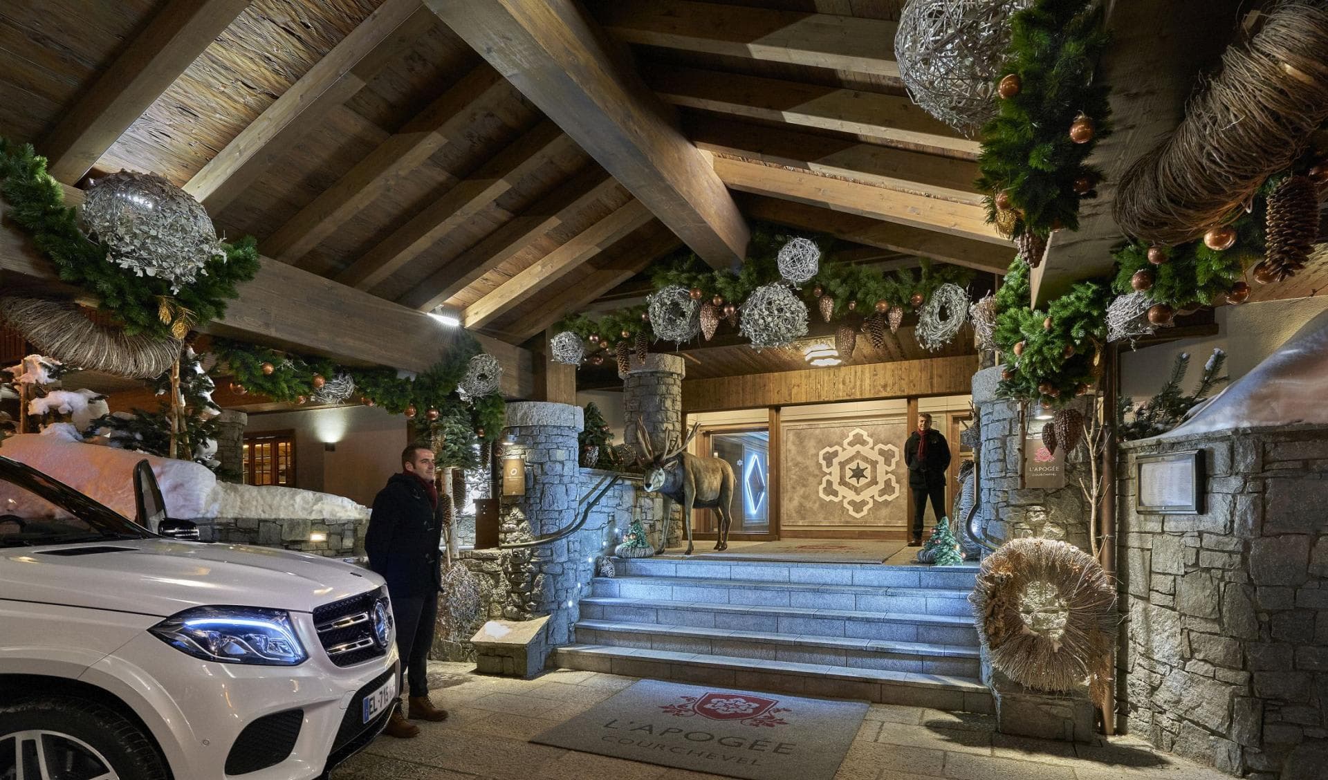 Porte-cochère entrance with valet service and heated stone walkway