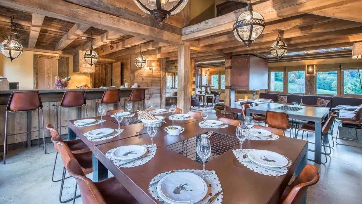 Open dining area with seating for 12 and breakfast bar for 4