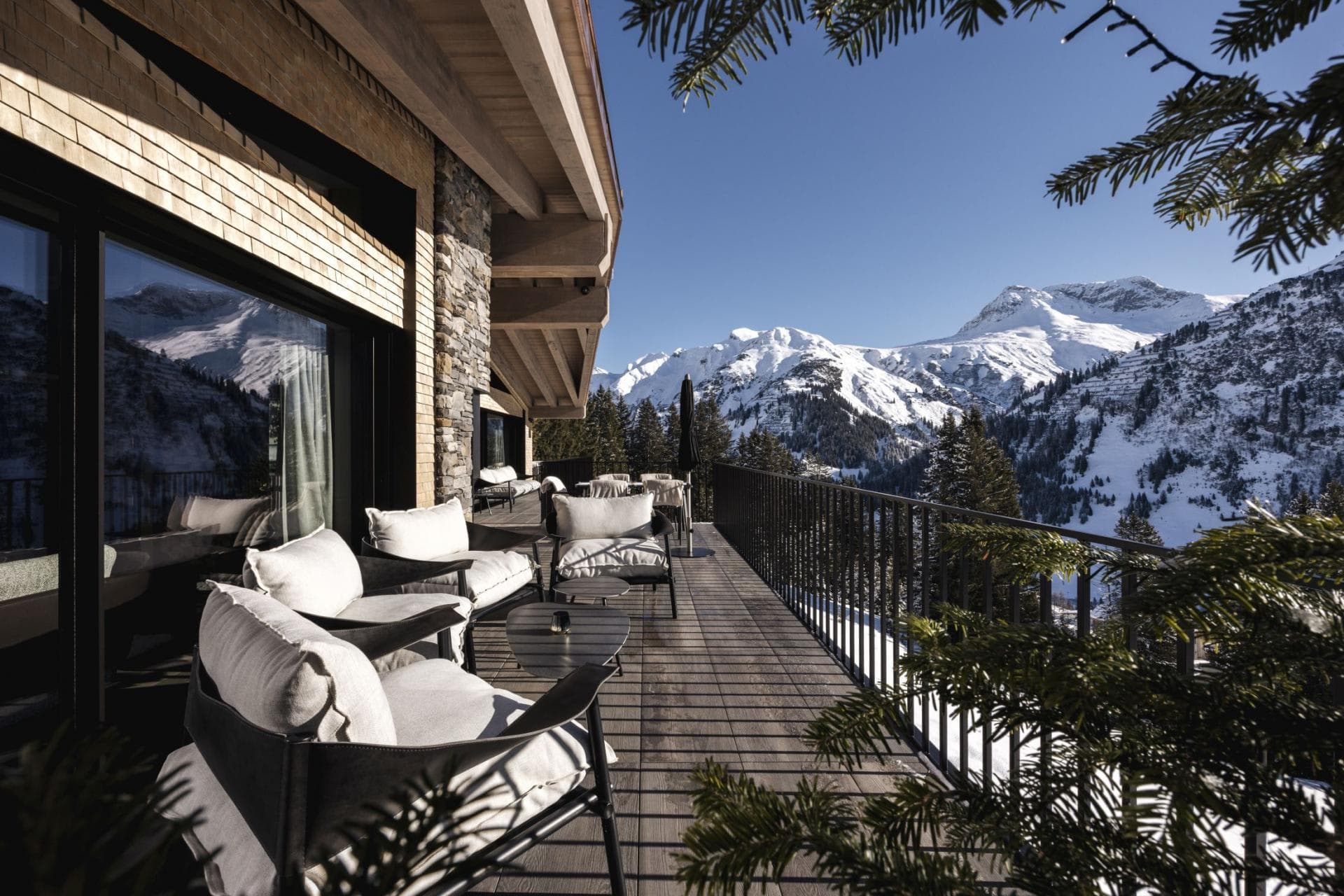 Balcony with lounge seating and panoramic mountain views