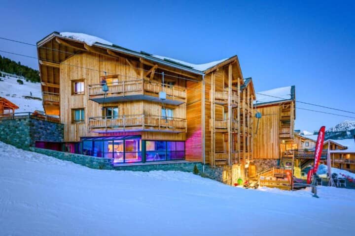 Ski-in, ski-out timber chalet with ground-floor indoor pool and private balconies