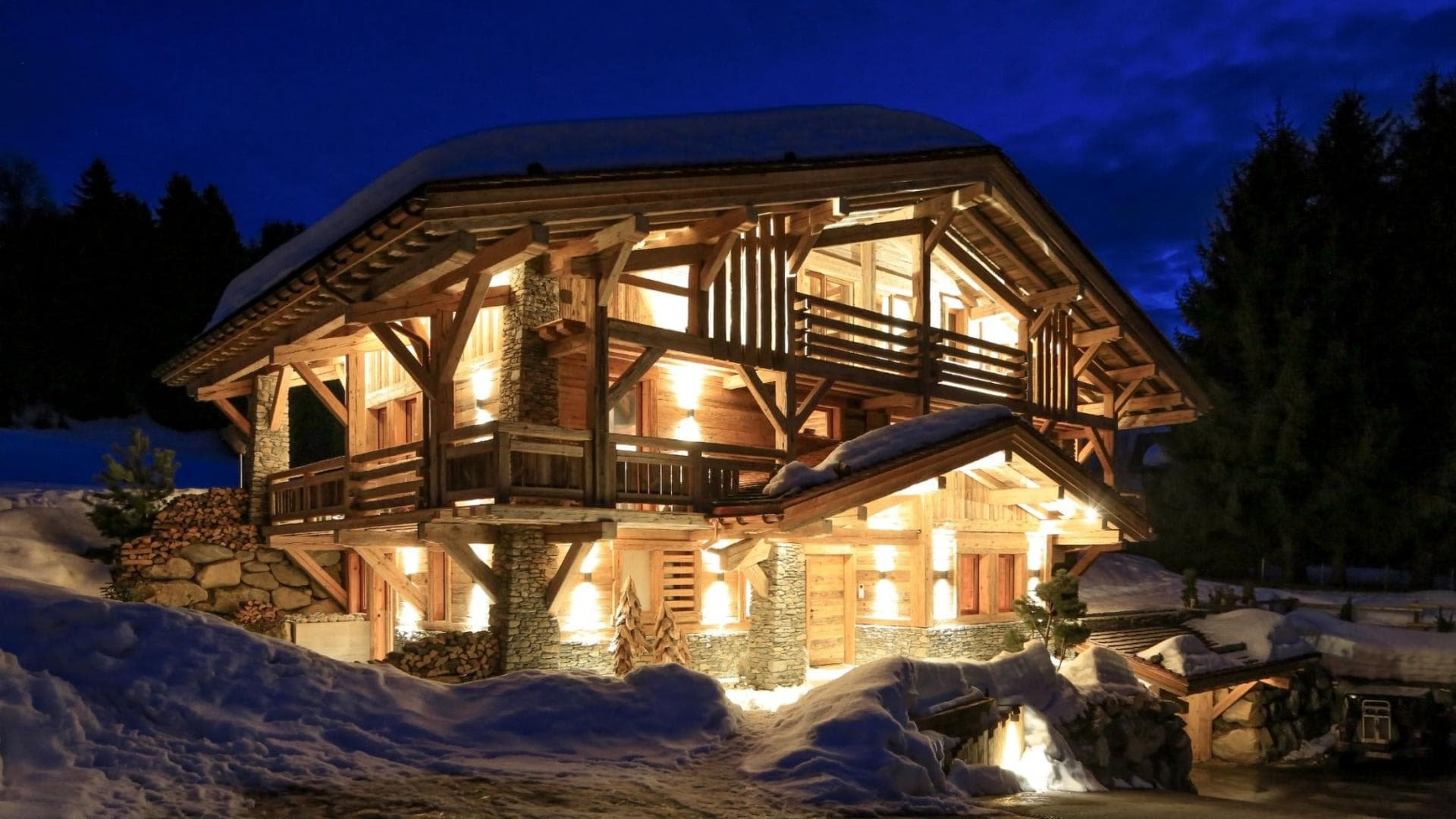 Ski-in/ski-out chalet with timber frame and wraparound balconies