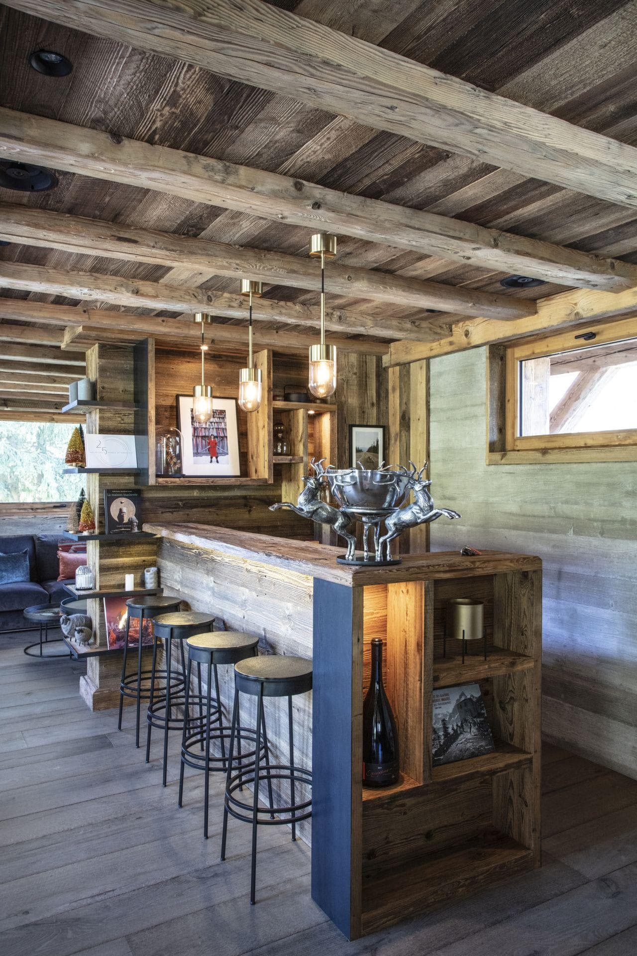 Reclaimed wood bar area with seating for 4 and integrated shelving