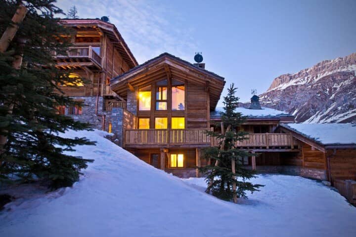 Ski-in, ski-out timber chalet with wraparound balconies and mountain views