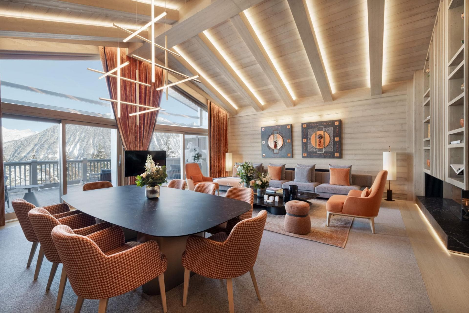 Open-plan living area; dining seating for 8 and mountain-view terrace