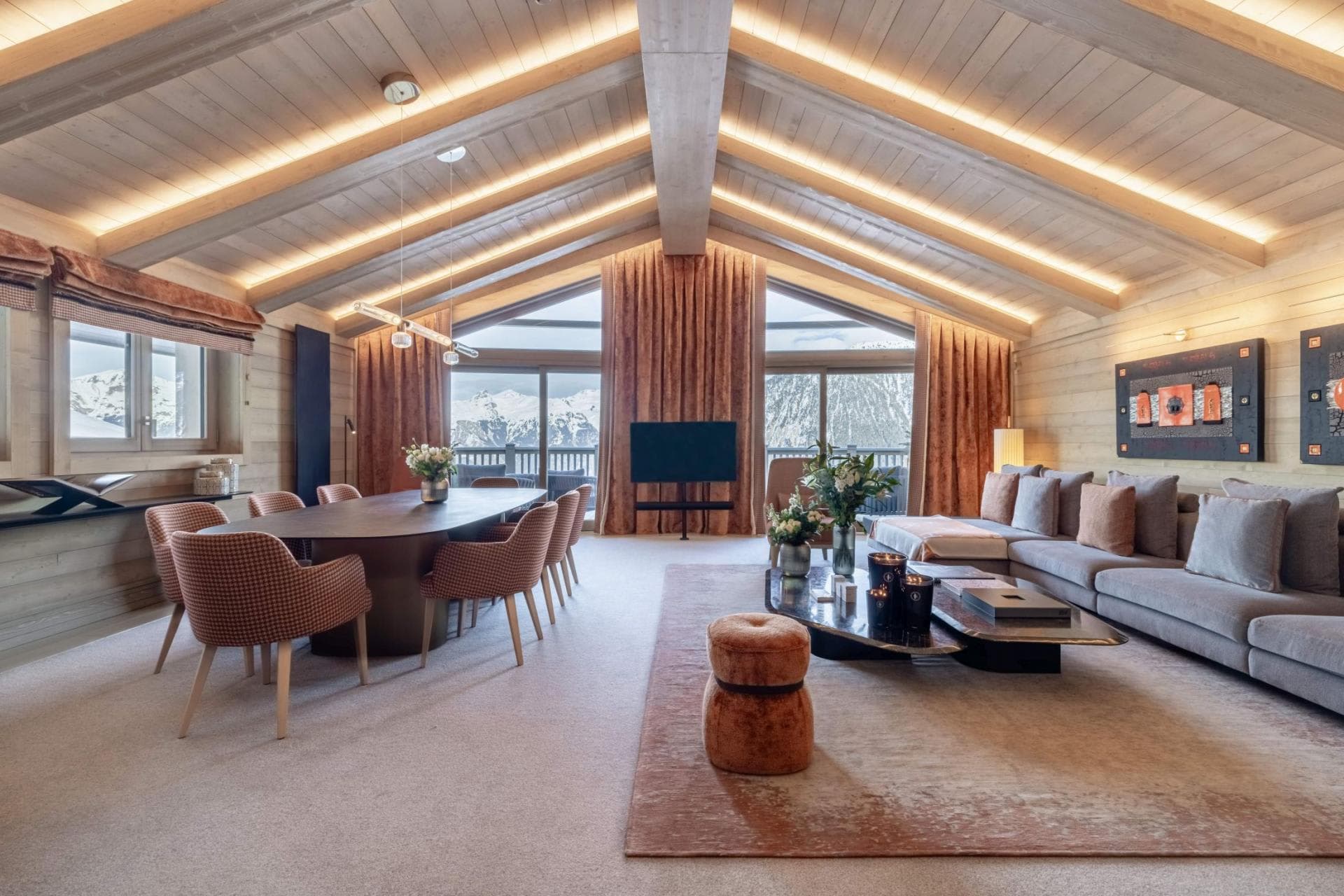 Open-plan living area; dining table for 10 with mountain views